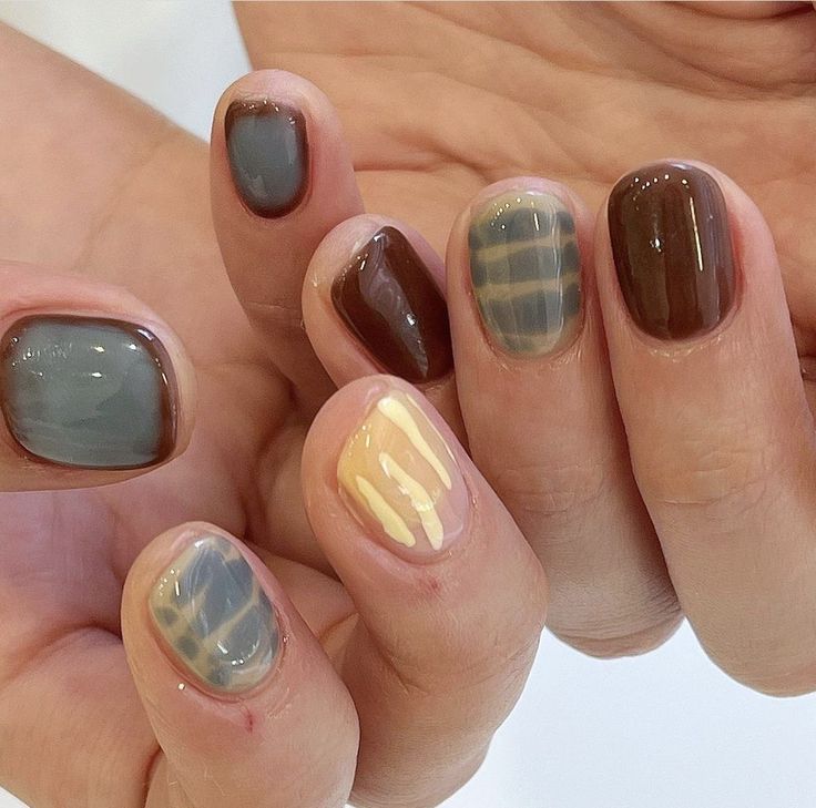 Trendy Nail Design: Muted Colors and Geometric Patterns for Any Occasion