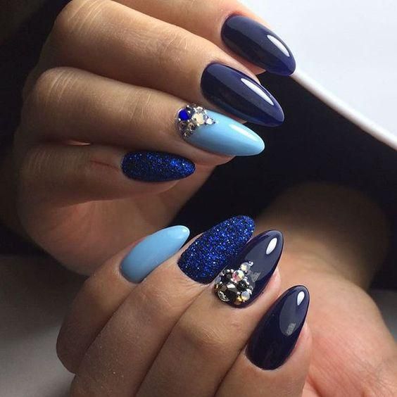 Stunning Sophistication: Deep Navy and Sky Blue Nail Design with Sparkling Accents.