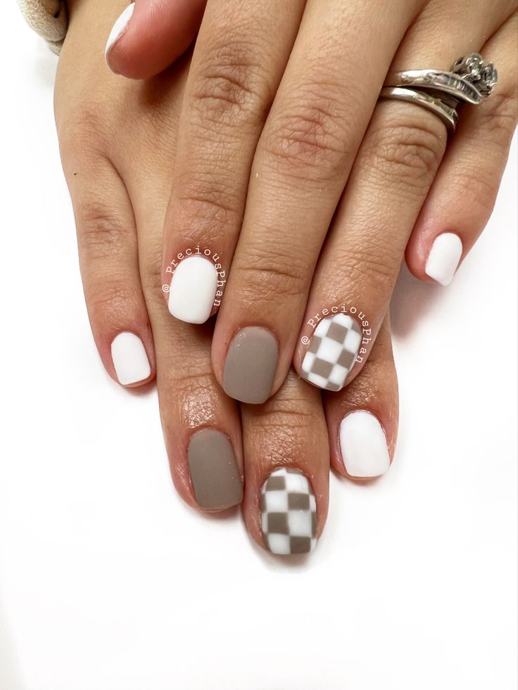 Elegant Chic Nail Design with Matte, Glossy Finishes and Playful Checkerboard Accent.