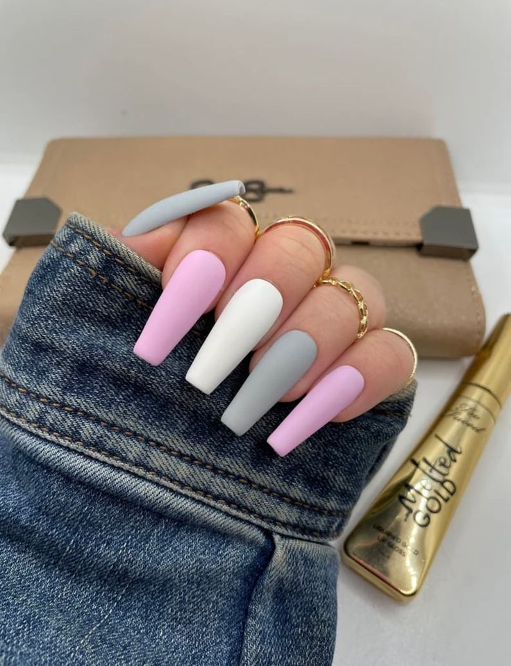 Chic Pastel Nail Design Showcasing Pink, White, and Gray with a Modern Twist.