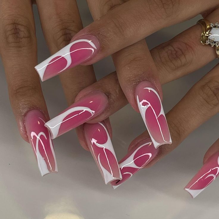 Chic Modern Nails: Soft Pink Base with White Geometric Accents.