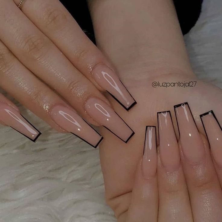 Chic Elegant Nail Design: Soft Nude Base with Striking Black Tips for Timeless Appeal.