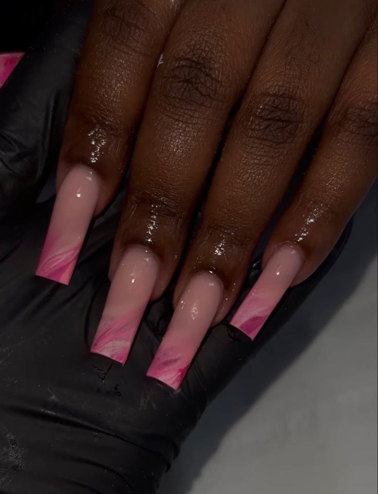 Elegant Ombre Nail Design with Gradient Pink Hues for a Striking Look.