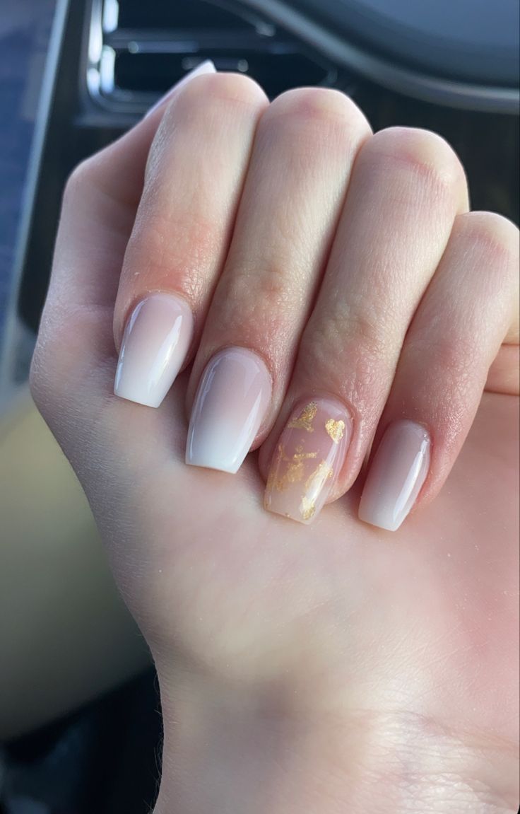 Elegant Gradient Nail Design with Golden Flakes for a Touch of Luxury