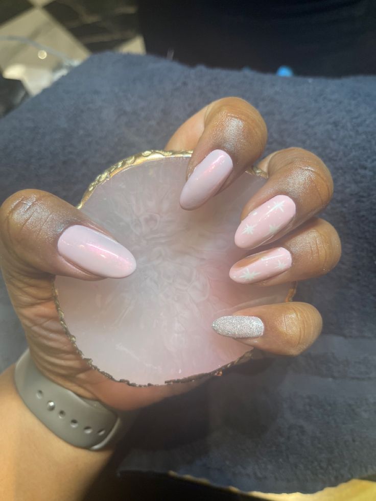 Chic Pastel Pink Nail Design with Sparkling Accent for Elegant Sophistication