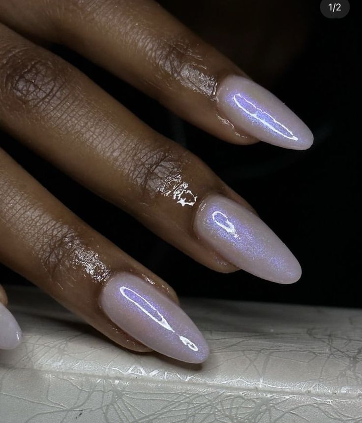 Elegant Soft Ombre Nails: Chic Iridescent Design with Glossy Finish and Almond-Shaped Tips