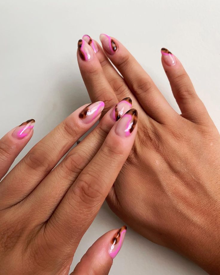 Elegant Ombre Stiletto Nail Design: Vibrant Pinks to Deep Brown Tips