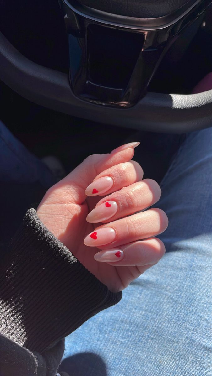 Elegant Natural Nail Design with Delicate Red Heart Accents