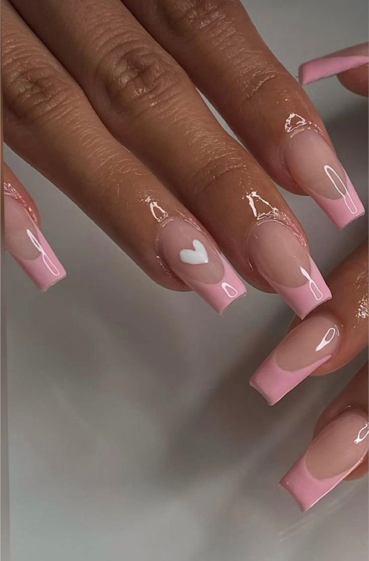 Charming Soft Pink Gradient Nail Design with Heart Motif