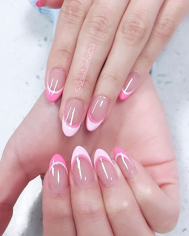 Chic Nail Design: Nude and Vibrant Pink with French Tips and Wavy Accent