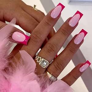 Playful Pink Ombre Nail Design: A Trendy Summer Aesthetic.