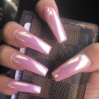 Sleek and Elegant Long Pink Nails: A Sophisticated Glamour for Any Occasion.