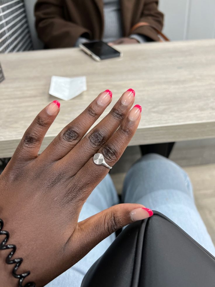 Chic Vibrant Pink French Tip Nails for a Playful Yet Polished Look.