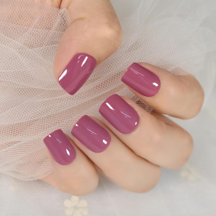 Sophisticated Glossy Mauve Nails: A Chic Design for Any Occasion.