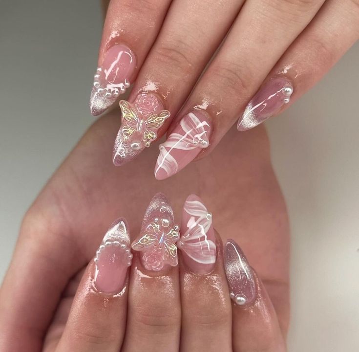 Whimsical Pink Nail Design with Butterfly Accents and Glamorous Silver Tips