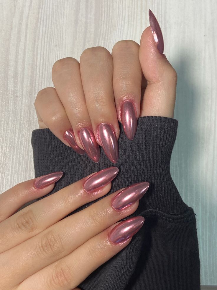 Chic Rose Gold Almond-Shaped Nails for Effortless Elegance.