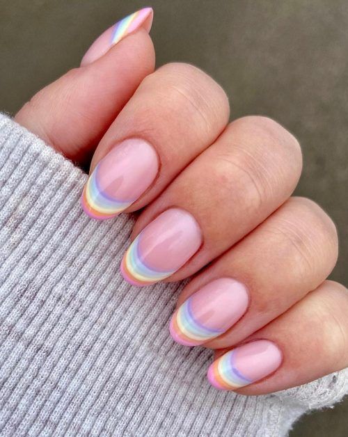 Vibrant Pastel Rainbow French Tips: A Playful Twist on Classic Manicure.