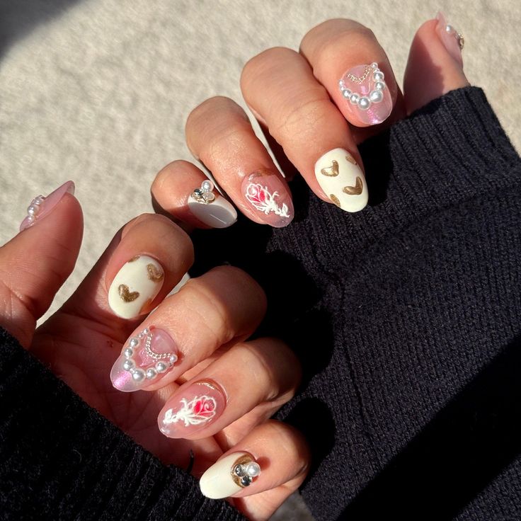 Romantic Pastel Nail Design with Intricate Embellishments and Mixed Finishes