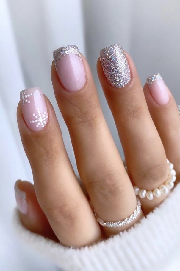 Chic Soft Pink Floral Nail Design Enhanced with Sparkling Silver Accents.