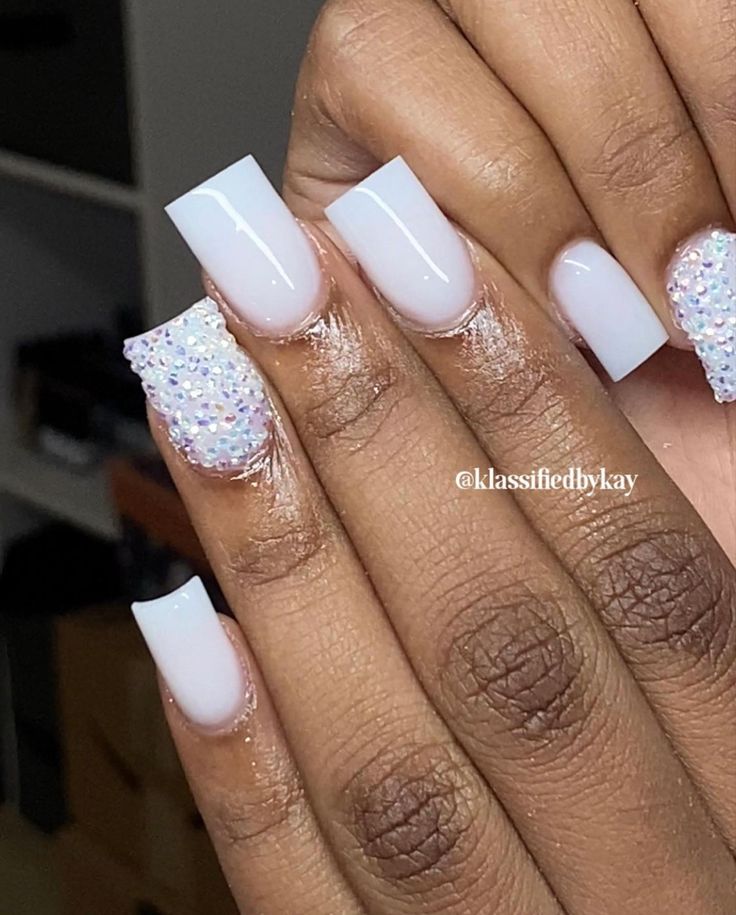 Elegant Nail Design with Glossy White, Iridescent Glitter, and Square Tips.