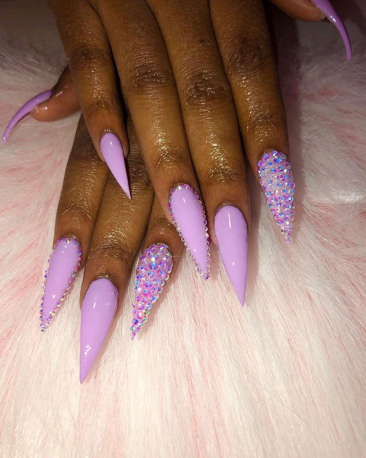 Chic Lavender Stiletto Nails with Glossy Finish and Dazzling Rhinestones.