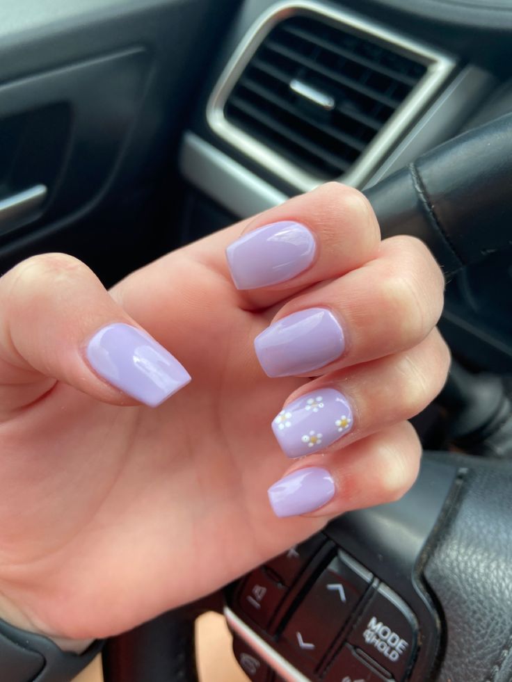 Chic Lavender Nails: Glossy Finish with Floral Accent for Any Occasion