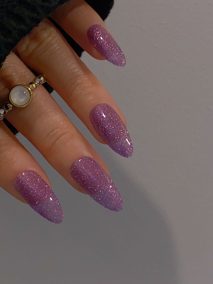 Radiant Purple Glitter Gradient Acrylic Nails: A Blend of Playful Sophistication and Elegance.