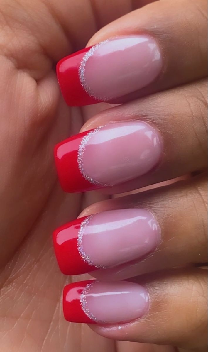 Bold and Elegant Shimmering Red French Tip Nails: A Modern Classic.