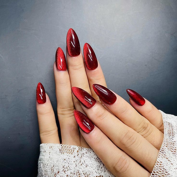 Striking Glamorous Red Stiletto Nails: Elegant, Glossy, and Alluring for Special Occasions.