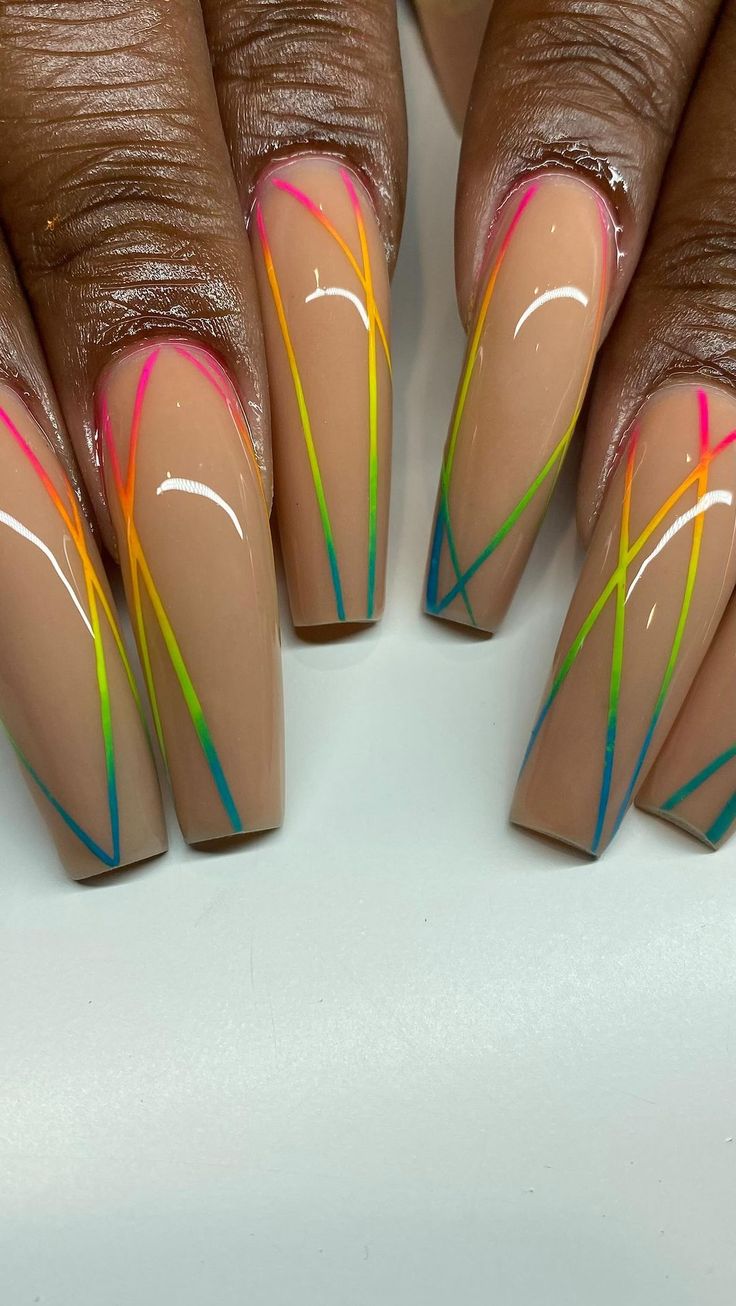 Vibrant Almond-Shaped Nail Design with Playful Diagonal Lines on Natural Beige Base