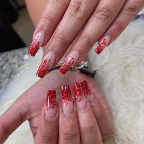 Vibrant Red Ombre Glitter Nails: Striking Glamour for Special Occasions.