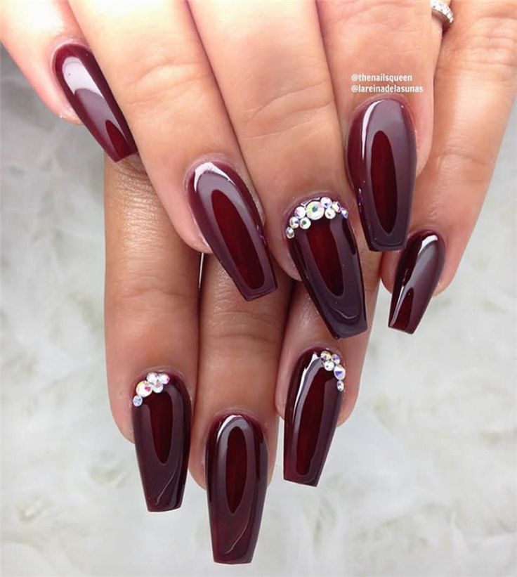 Glamorous Burgundy Nails with Rhinestones for a Bold Statement.