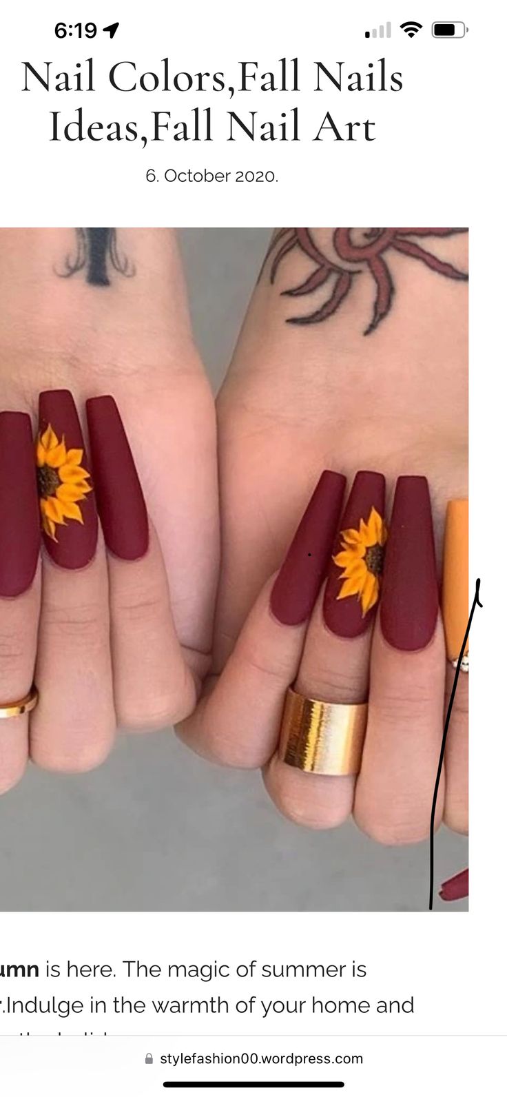 Autumn Elegance: Deep Burgundy Nails with Intricate Sunflower Accents