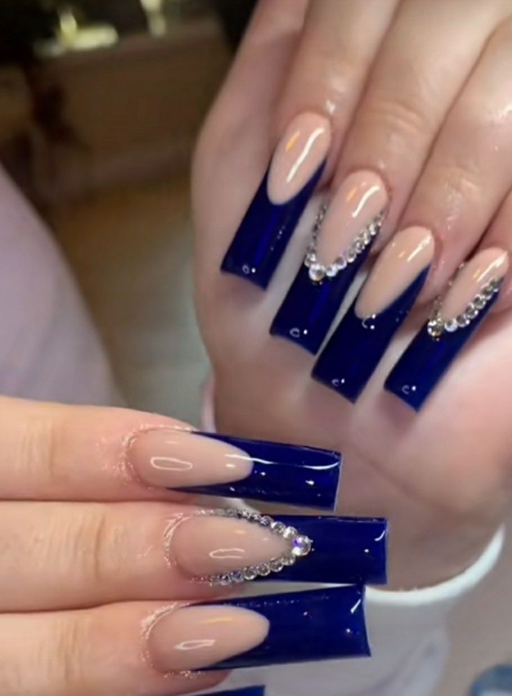 Chic Nail Design: Elegant Navy Blue and Nude with Rhinestone Accents