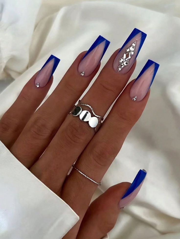 Elegant Long Blue Gradient Nail Design with Glamorous Silver Accents