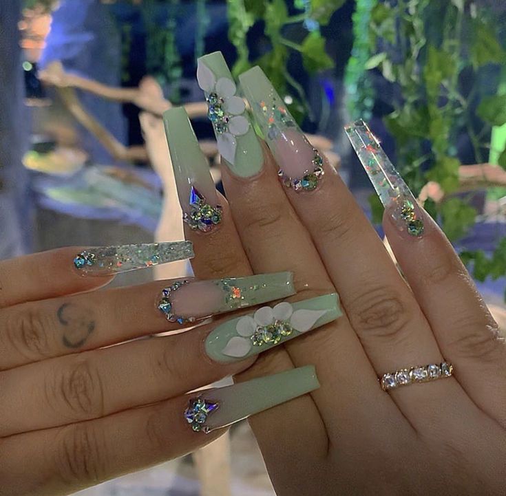 Elegant Pastel Green Long Nails with Rhinestones and Floral Accents