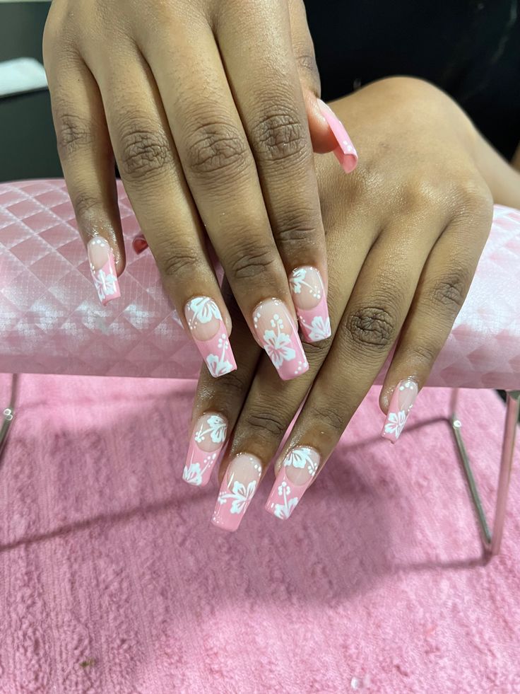 Elegant Floral Nail Design in Soft Pink for Spring or Special Occasions.