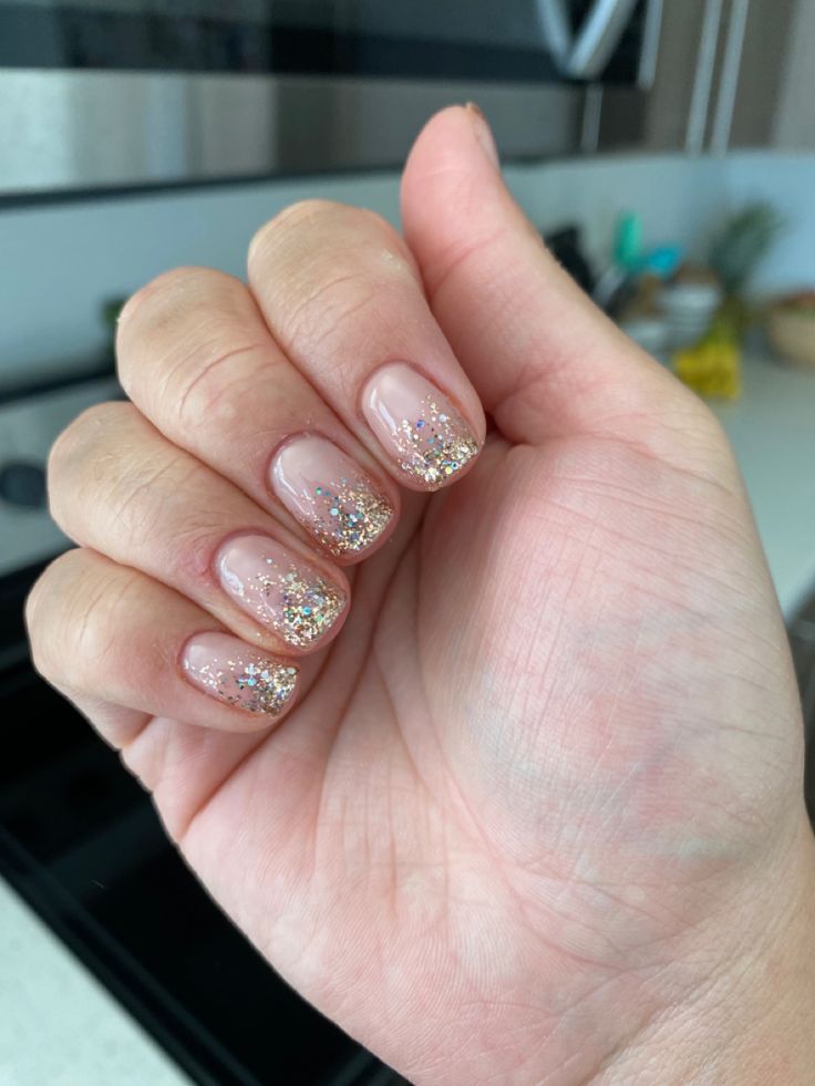 Elegant Ombre Glitter Nail Design on Nude Base