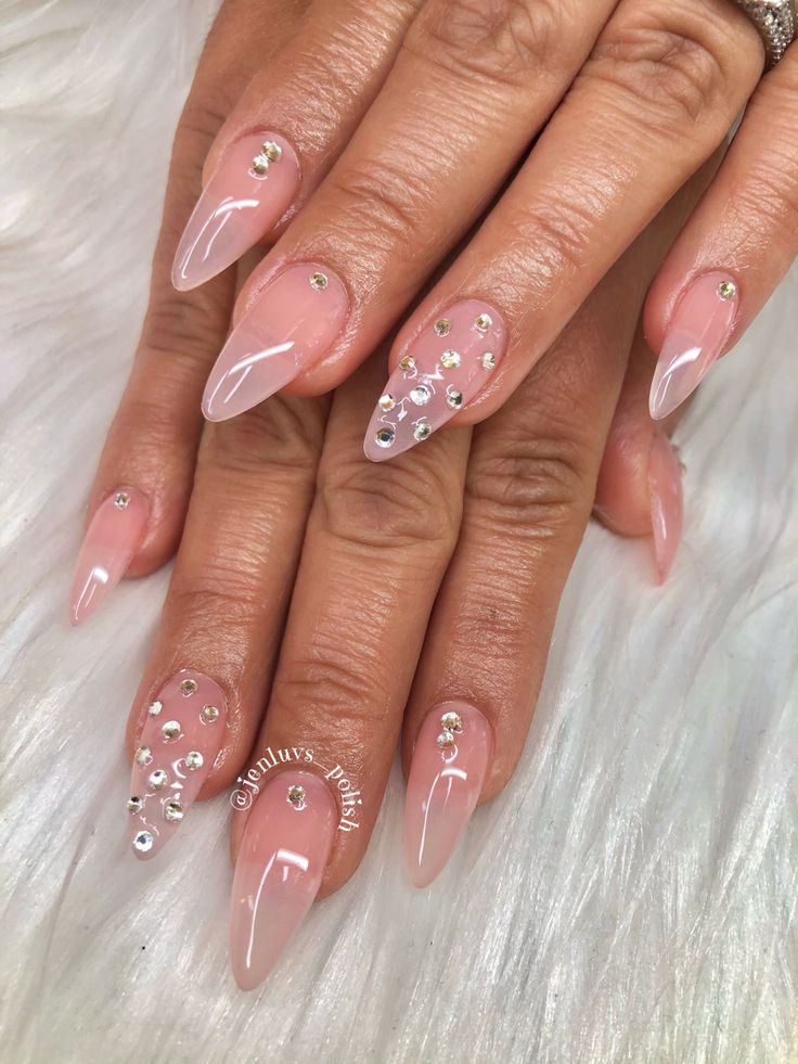 Chic Almond-Shaped Nails: Soft Nude Base with Rhinestones and Matte-Gloss Finish for Glamour.