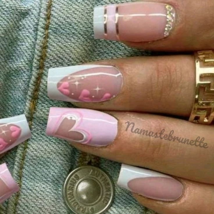 Chic Soft Pink and White Heart Nail Design with Sparkling Accents and Glossy Finish