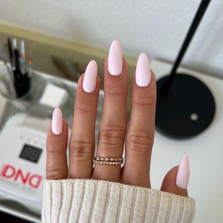 Chic Pastel Pink Almond-Shaped Nails: Elegant Minimalism for Any Occasion