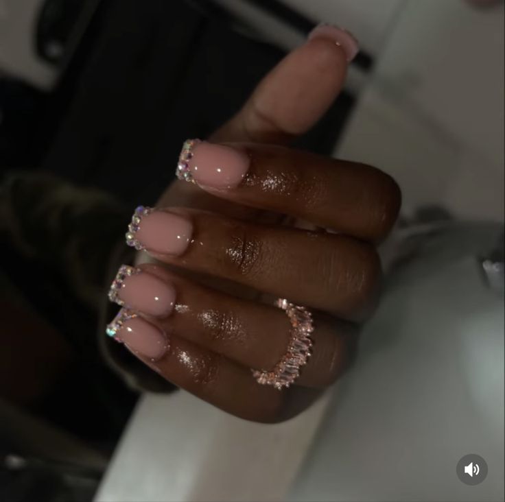 Chic Soft Pink Nail Design with Glamorous Rhinestone Accents