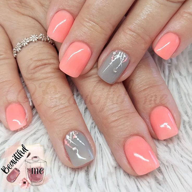 Elegant Coral and Gray Nail Design with Floral Accents.