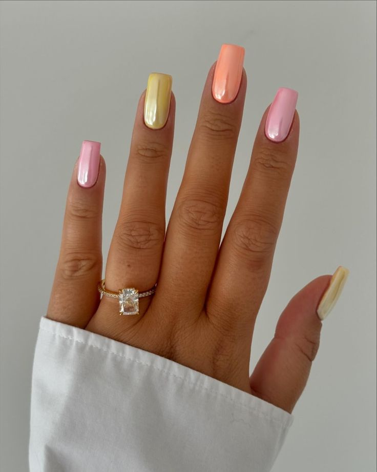 Vibrant Pastel Nail Design with Chic Glossy Finish and Elegant Accessories.