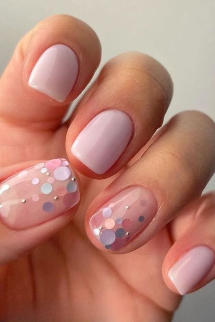 Whimsical Pastel Nail Design with Lavender Base and Colorful Confetti Accents.