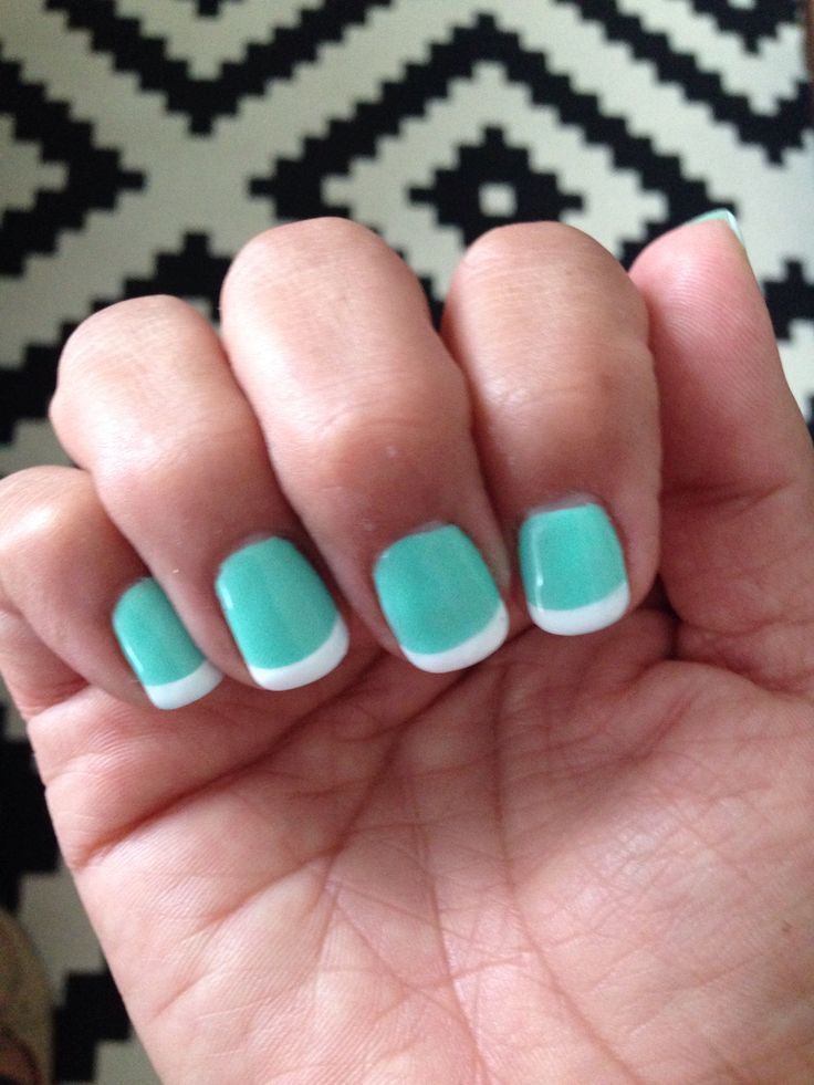 Vibrant Turquoise and White Tip Nail Design: A Chic Modern Twist on the Classic French Manicure.