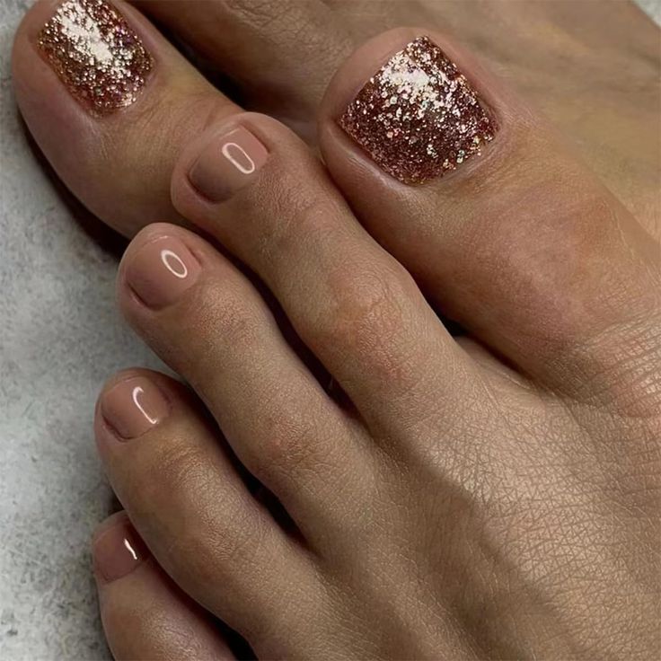 Elegant Nude and Glitter Toenail Design for Sophisticated Looks.