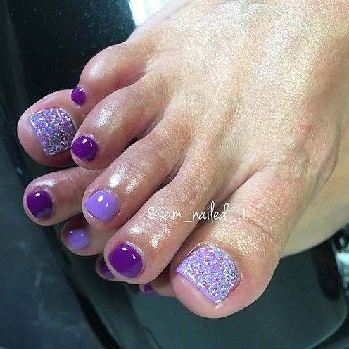 Glamorous Summer Pedicure: Glossy Purple and Lavender with Glitter Accent.