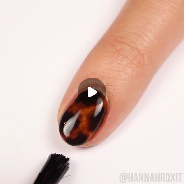 Chic Tortoiseshell Nail Design: Glossy Finish with Rich Brown and Black Tones