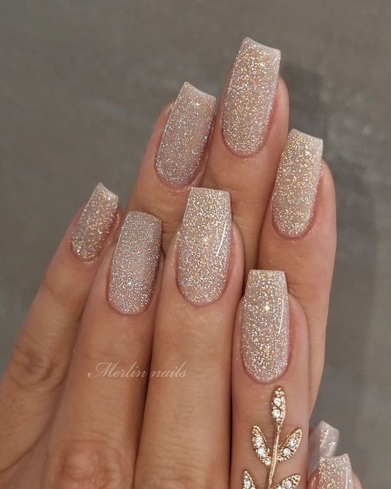 Elegant Glittering Nude Nail Design with Square Tips and Gold Leaf Accent